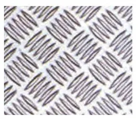 Chequer-plate patterned metal sheet.